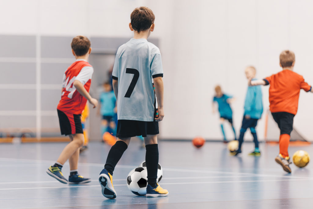futsal boys in training game kids play indoor soccer practic